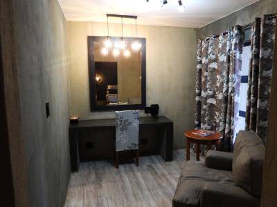 Green Chameleon 8 (Upstairs Room)